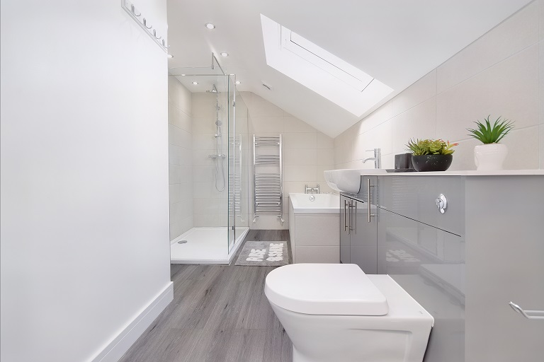Enhanced photo showing a bright and well detailed loft bathroom