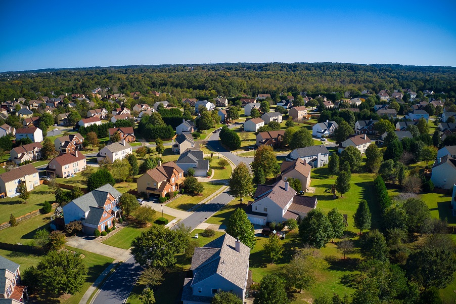 Elevated image showing properties in a neighbourhood.