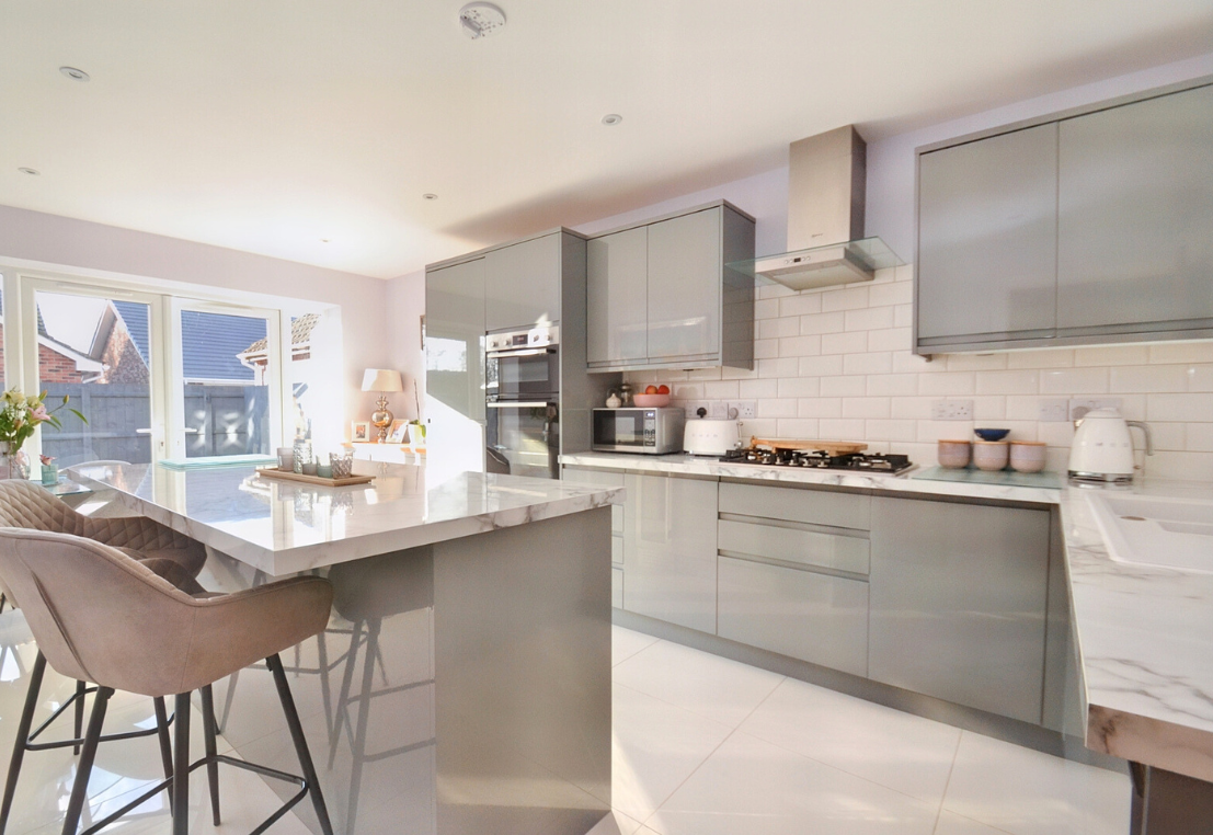 A perfectly enhanced kitchen photo with birght natural light and colour