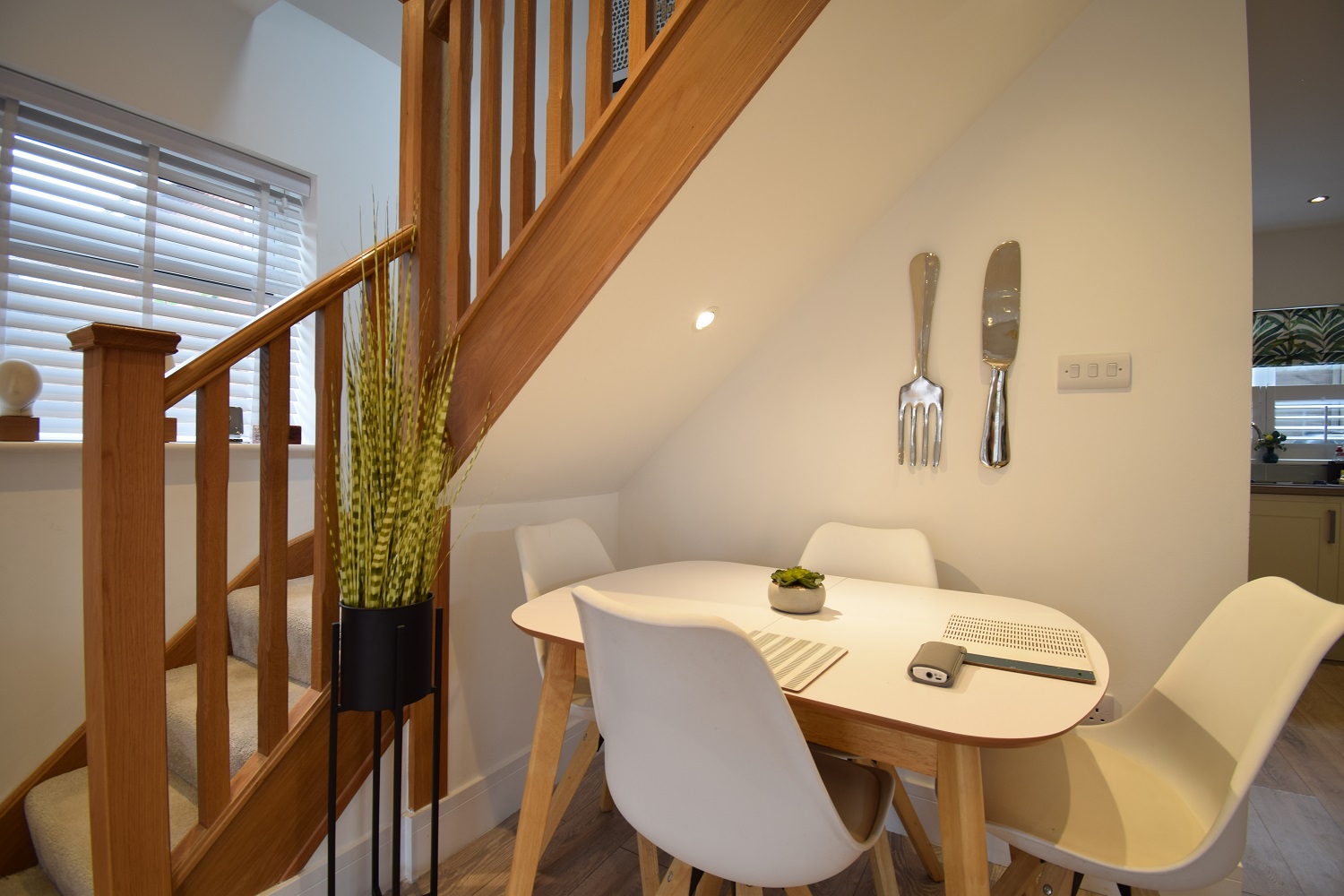 A dark understairs dinning table